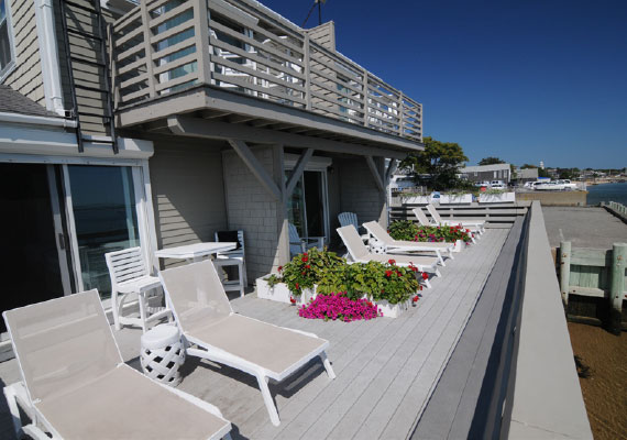 Room Layout: 1 queen bed, one twin bed. Located on the first level with a harbor view and outdoor waterfront seating, air conditioning and heating with in-room controls, insuite full bath, complimentary bath robes, morning coffee service, dry bar with refrigerator, WiFi, iHome, Comcast TV/DVD. Every room with a view.